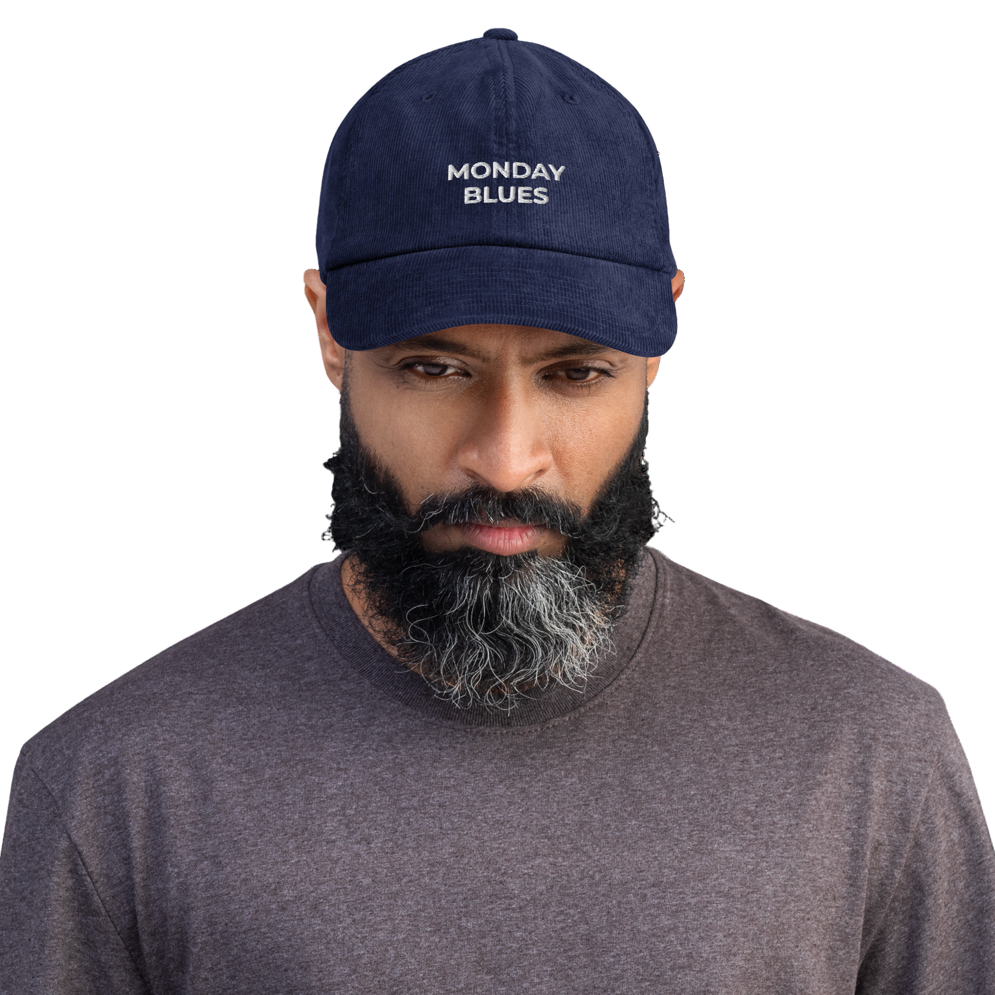 Man wearing a navy cap with 'MONDAY BLUES' text on a white background